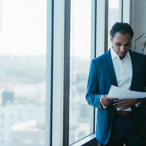 Navy tailoring by the window